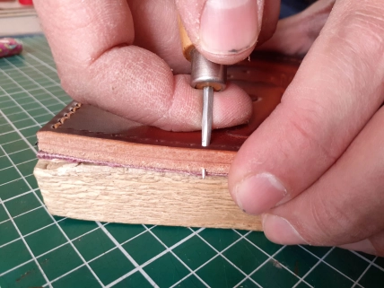 Punching diagonal holes Punching diagonal holes