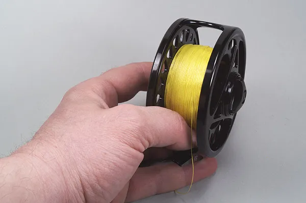 Backing done - Modern backing is very compact, and on a large arbor reel like this one, there is no reason to overdo the amount. This little 5-6 weight reel now contains more than 100 yards of backing, which should enable you to cope with even the fiercest of fish that you are likely to want to catch on a 5 weight line.